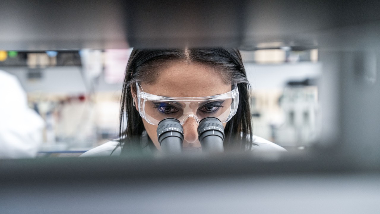 woman scientist microscope